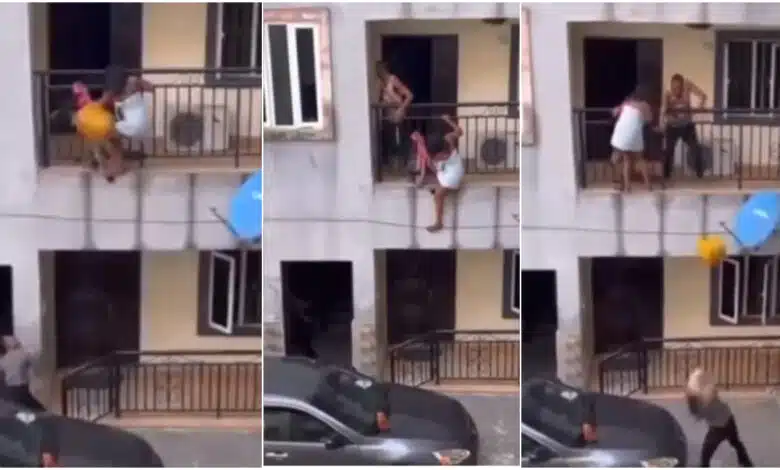 Side chic spotted trying to jump down from building as lover’s wife returns unexpectedly (Video)