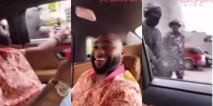 Read more about the article Davido called out for smoking weed in front of police (Video)
