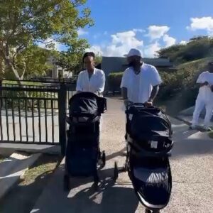 Read more about the article “Papa and Mama Adeleke”  – Davido and Chioma spotted taking twins for a stroll  on vacation (Video)